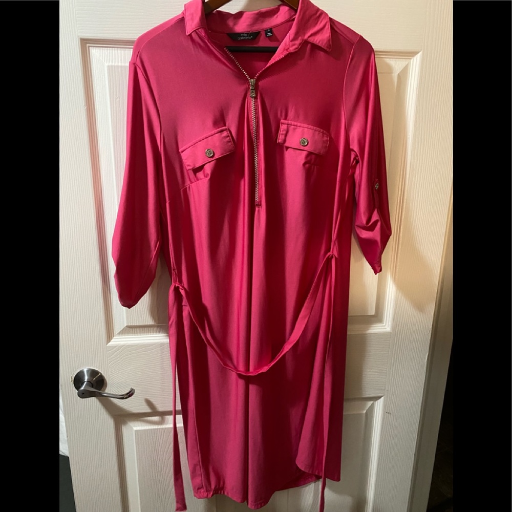 Size 1X dress but fits XL. Form fitting. Fun hot pink. Never worn.